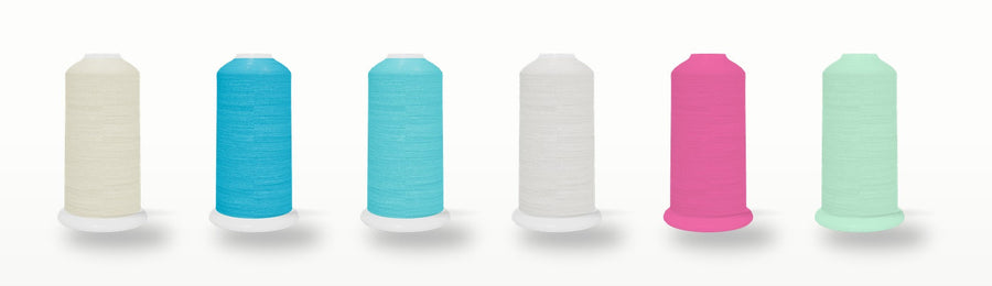 SILKhee Pigment pack — polyester machine embroidery thread cones in the pack's colors